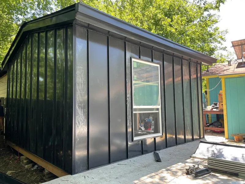 Black standing seam metal wall panels for Metal Roof Installation in Wyoming