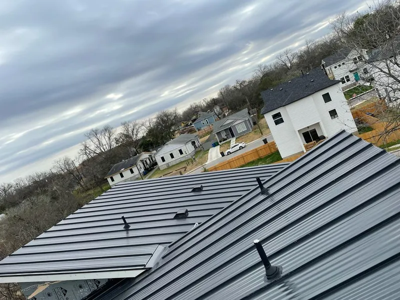 Standing seam metal roof panels with vents for Skylight Repair in Wyoming